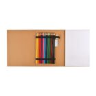 Open sketchbook with blank pages on the right, and on the left, a set of colored pencils organized in a row. A small eraser is also visible, secured by elastic bands. Book cover is brown.