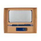 A brown box containing a silver cardholder, a blue pen, and a blue USB flash drive, all neatly arranged.