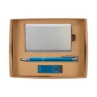 A gift box containing a silver cardholder, a blue and silver pen, and a blue USB flash drive. The items are neatly arranged on a brown cardboard base within the box.