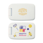Rectangular sewing kit with two views. Top view displays EXQUILUX GARDEN HOTEL logo in gold. Bottom view features images of a spool, scissors, buttons, and needle with CRAFTY NEEDLES text.