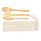 A set of bamboo cutlery including a fork, knife, and spoon, arranged above a beige fabric pouch with a drawstring closure. The utensils and pouch are placed on a plain white background.