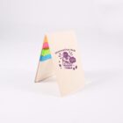 A small, open cardboard folder with colorful sticky notes inside. The front cover has the purple text Innovative Hub and a graphic with the words Brain Dump featuring a brain and lightbulb illustrations.