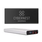 Silver power bank with CYBERNEST solutions logo. Displays a lit screen showing charge level, with multiple USB ports in black and red for connectivity.