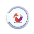 A round white mobile accessory with a gray rim features a stylized fox logo in gradient orange and purple colors. Below the fox, the text reads Fox Mobile.