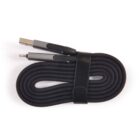 A coiled black braided charging cable with a USB connector on one end and a Lightning connector on the other. It is secured in place with a black Velcro strap.