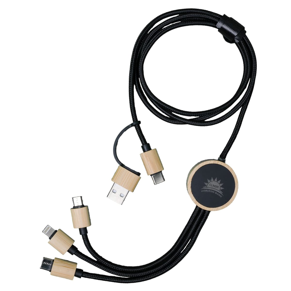 A multi-device charging cable featuring a black, braided design with wooden accents. It includes multiple connectors: USB, USB-C, micro-USB, and Lightning. A circular wooden element is attached to the cable with a sun logo in the center.