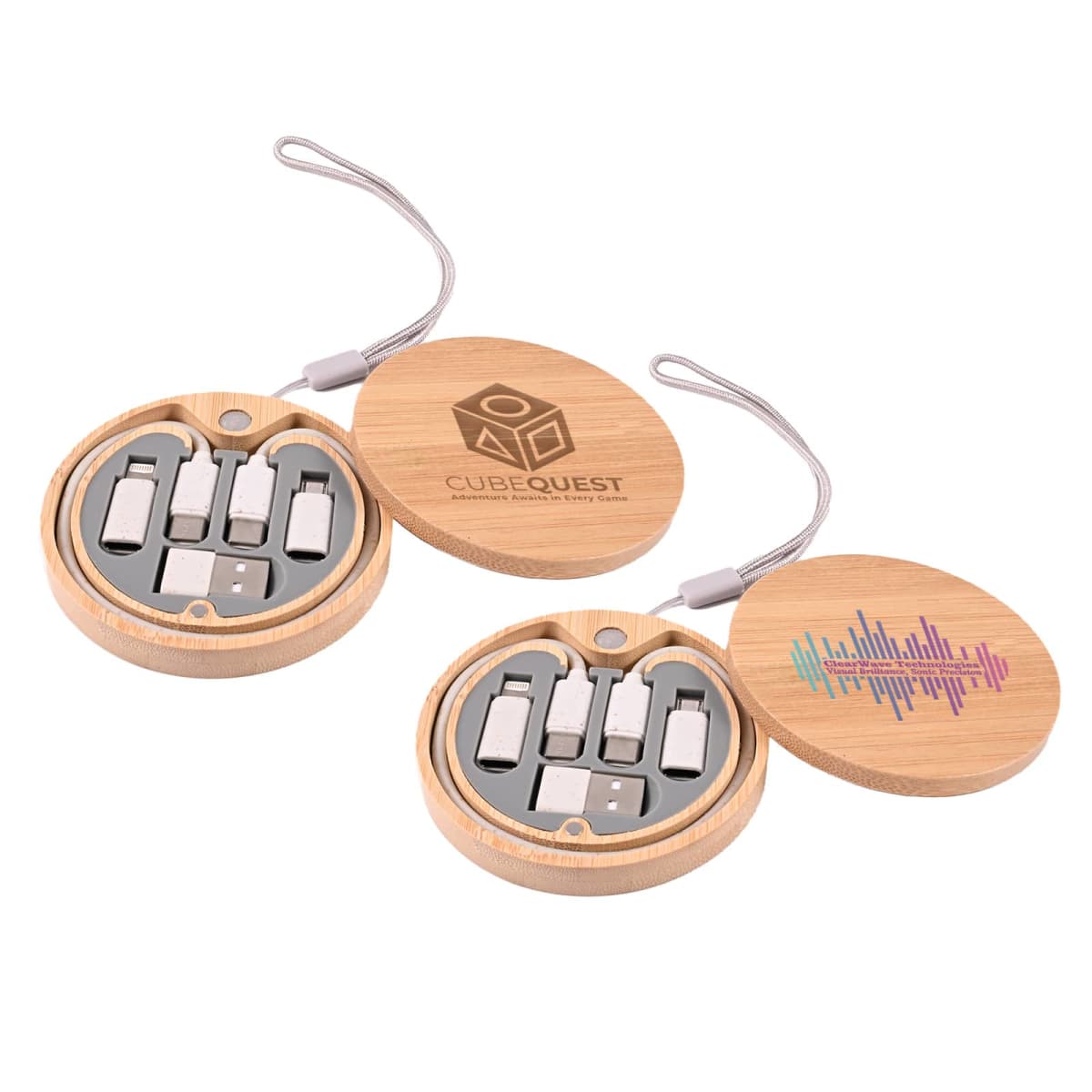 Two round wooden cases with lids open, each containing USB adapters and connectors. One lid has CUBEQUEST logo, and the other displays colorful soundwaves. Each case has a string loop for carrying.