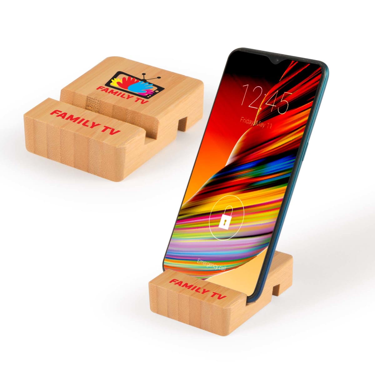Wooden smartphone stands with Family TV logo, featuring a phone displaying a vibrant screen. The stands have grooves to securely hold the phone in place.