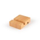 Wooden phone stand with a rectangular base and a groove to hold a device, made of light-colored wood, on a white background.