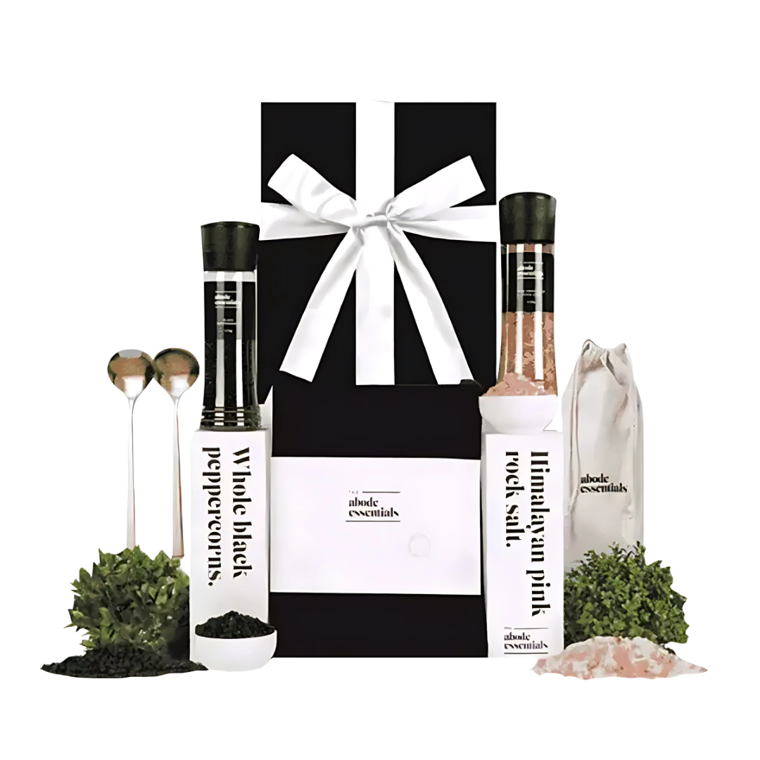 New Abode set: Gourmet salt, pepper, utensils, & decorative greenery.