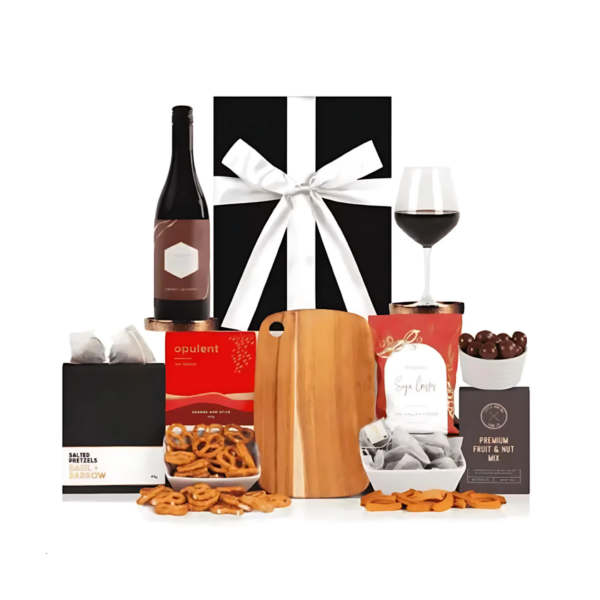 Oasis Welcome Home Gift Sets: wine, chocolates, nuts, pretzels on a board in a ribboned box.