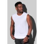 Man wearing a white sleeveless shirt and dark pants against a gray background.