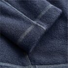 Close-up of folded dark blue fleece fabric with visible stitching.