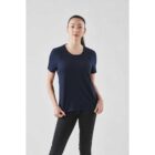 Person wearing a dark blue t-shirt and black pants, standing against a plain background.