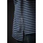 Close-up of a person wearing a navy blue and white striped shirt with side slits.