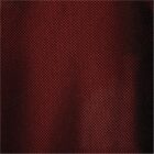 Close-up of red and black patterned fabric with a textured, dotted design.