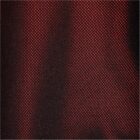 Red and black checkered textile pattern with fine mesh texture.