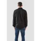 A man in a black shirt and jeans, standing, shown from the back against a plain background.