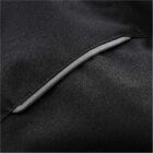 Close-up of a black fabric with a seam and a gray, diagonal piping detail.