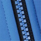 Close-up of a blue zipper on a blue fabric background.