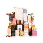 YuleFest Holiday Spritz Gift Sets with snacks, drinks, and foliage in a festive tote.
