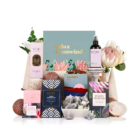 Zenin Wellness Gift Set with flowers, chocolates, skincare & relax & unwind sign.
