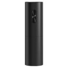 Sleek black cylindrical spray bottle with a central button.