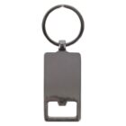 A metal keyring with a rectangular plate attached, featuring a built-in bottle opener at the bottom. The design is simple and sleek, with a shiny silver finish.