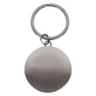 A silver keychain with a round, blank metallic disc attached to a circular keyring. The surface of the disc is reflective and smooth, with no additional designs or engravings.