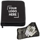 Black zippered case with Your Logo Here text, next to an open view showing a set of white-handled cutlery including a knife, fork, spoon, and a corkscrew inside transparent slots.