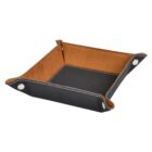 Rectangular leather valet tray with black exterior and brown interior. The sides are snapped together at the corners, and white stitching is visible along the edges. Suitable for holding small items like keys or coins.