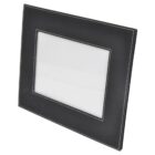 A black rectangular picture frame with a white inner border, designed for tabletop display. The frame has visible stitching along the edges and surrounds an empty center space intended for a photo.