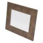 A brown, leather-textured photo frame with visible stitching. The frame is rectangular and empty, standing at an angle against a white background.