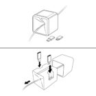 A two-part illustration shows a cube-shaped device for cable management. The top image depicts a cable inserted into the cube. The bottom image shows the cube opened, revealing slots for inserting different types of connectors.