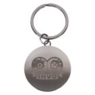 Round metallic keychain with an engraved design featuring a globe and a bicycle wheel, along with the letters IHVO on a ribbon.