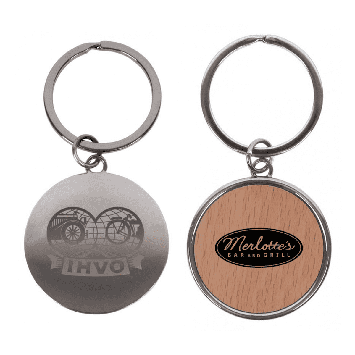 Two circular keychains. The left one features a metallic front with a globe and IHVO logo. The right one has a wooden front with an oval black and brown label reading Merlottes Bar and Grill. Both have silver key rings.