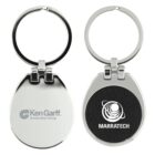 Two silver keychains with oval-shaped attachments. The left shows the Ken Garff Automotive Group logo, and the right displays the MARRATECH logo with a stylized circular design.