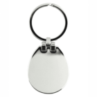 A silver oval-shaped keychain with a smooth, polished surface. The keychain has a round ring attached at the top, allowing keys to be attached. The metal is shiny, reflecting light softly.