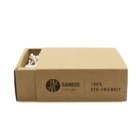 A brown cardboard box with text Bamboo range and 100% Eco-Friendly is open to reveal cotton swabs with bamboo sticks inside. The swabs are partially visible, and the box has minimalistic, eco-friendly packaging.