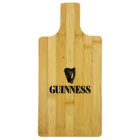 A wooden cutting board with a handle features the word GUINNESS and a harp symbol printed in black on the surface. The boards wood grain is visible, giving it a natural appearance.