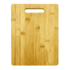 A rectangular bamboo cutting board with a handle cutout at the top. The board has a smooth surface with visible natural wood grain patterns.