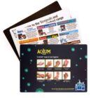 Three colorful printed cards stacked, with the top card showing hand hygiene steps and images.