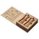 A wooden gift box with engraved cheese and wine-related designs, containing two wooden bottle-shaped items. The packaging is open, showcasing the contents inside.