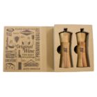A set of two wooden salt and pepper mills in a cardboard box. The box features vintage-style graphics with words like Parmesan, Original Wine, Gruyere, and Premium Quality. Each mill has a space labeled Your Logo Here.