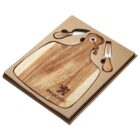 A boxed set containing a wooden cutting board with a carved lion emblem and the word Peugeot. It includes a small cheese knife and fork with matching wooden handles, all set in protective packaging.