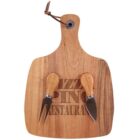 Wooden pizza board with Pizzeria and Restaurant engraved text, featuring two cheese knives with wooden handles placed on top. A leather loop is attached to the handle for hanging.