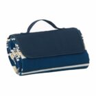 A rolled-up blue and beige striped picnic blanket with a dark blue flap and a black carrying handle on top.