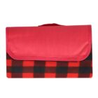 A folded red and black checkered blanket with a red flap and handle, designed for easy carrying. The checkered pattern features alternating squares of red and black.