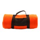 A rolled-up bright orange fleece blanket with a black carrying handle and straps.