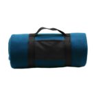 A rolled-up teal blanket with a black handle attached, designed for easy transport. The blanket is compact and neatly wrapped, ideal for travel or outdoor activities.